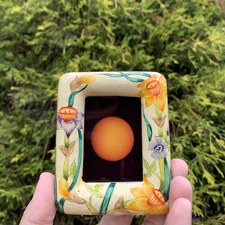 Sun inside floral frame